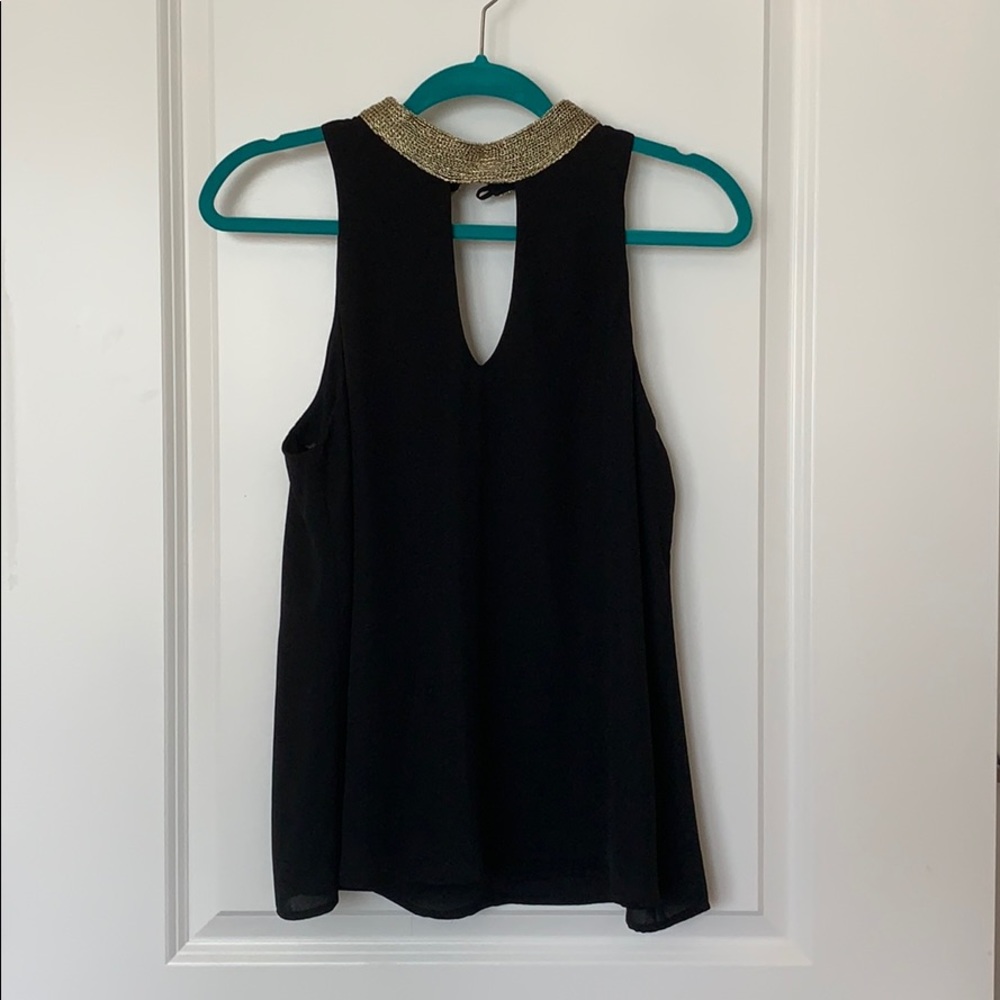 Black and gold top